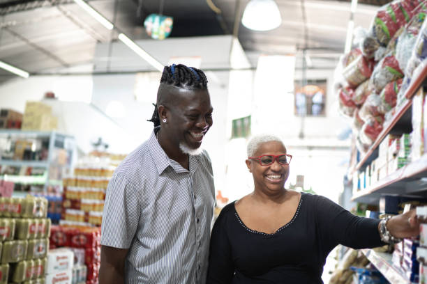 istock Happy customers choosing product at wholesale 1184827886