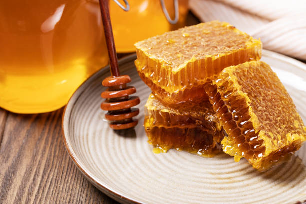 istock Honey and Honeycomb slice 1184829984