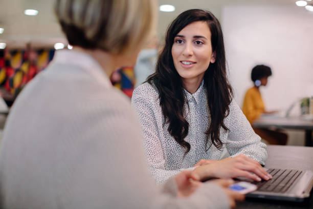 istock Businesswomen Discussing In Office 1184835391
