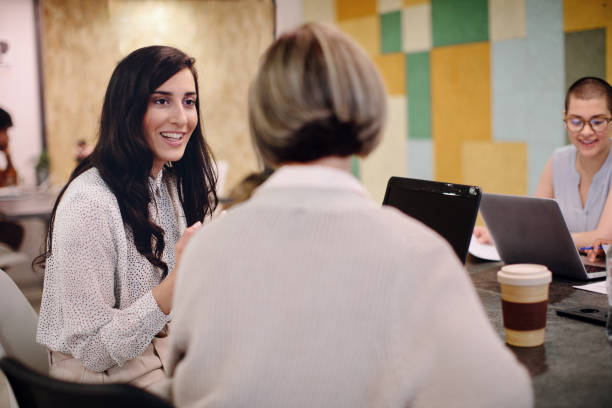 istock Businesswomen Discussing In Office 1184835480