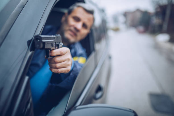 istock An FBI agent uses a gun in action 1184837061