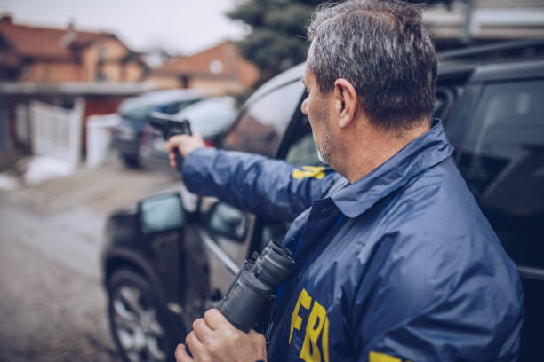 istock An FBI agent uses a gun in action 1184837652