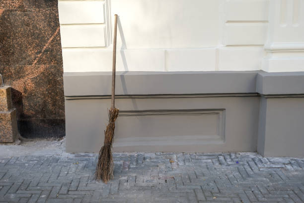 istock Broom for cleaning sidewalks on a city street. 1184839525