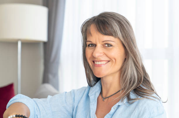 istock beautiful middle aged woman resting 1184841365