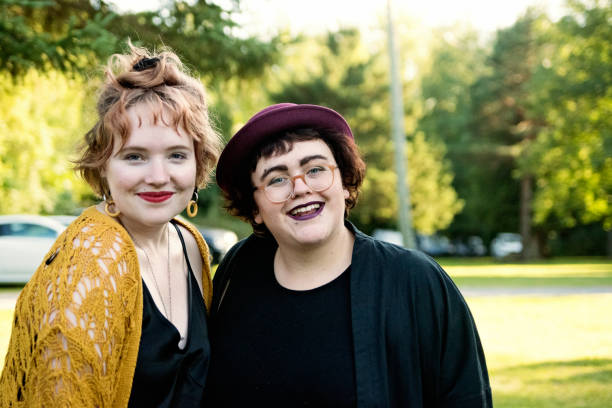 istock Wedding guests, young trendy lesbian couple. 1184847318