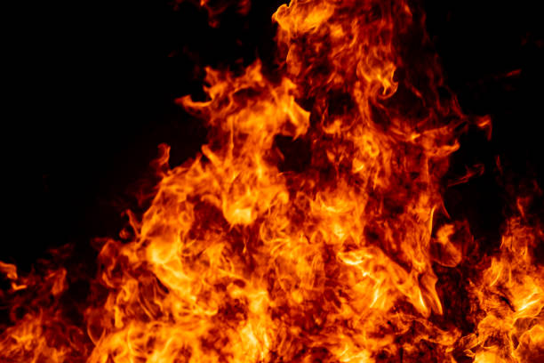 istock Red hof fire flame burn fuel glowing on black background 1184847403