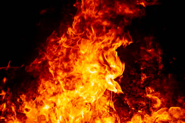 istock Red hof fire flame burn fuel glowing on black background 1184847438
