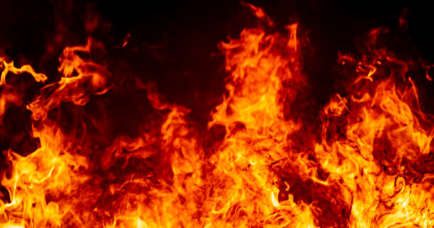 istock Red hof fire flame burn fuel glowing on black background 1184847466
