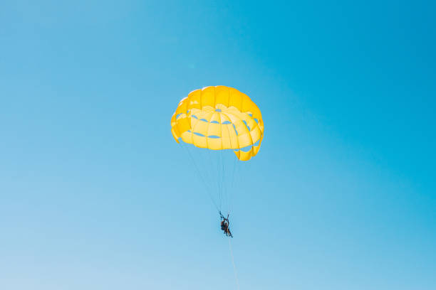 istock Parasailing - summer fun at sea 1184849939