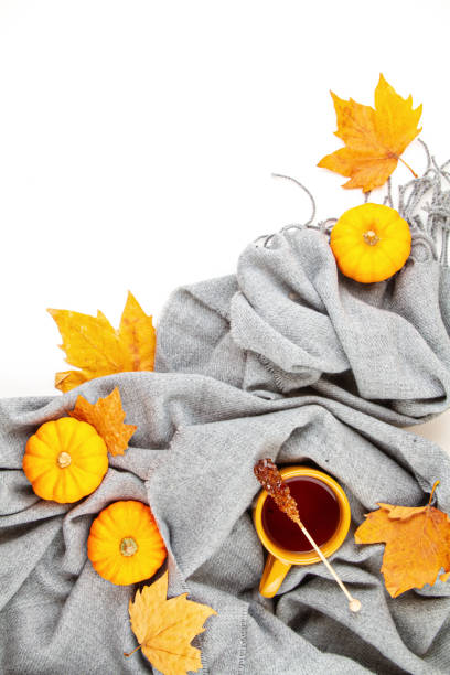 istock Flat lay autumn composition with cup of tea and a warm woolen scarf 1184851231