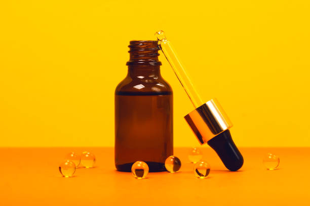 istock Face serum and vitamin capsules 1184851571