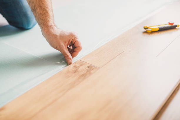 istock European man working at home - laying polystyrene substrate 1184852663