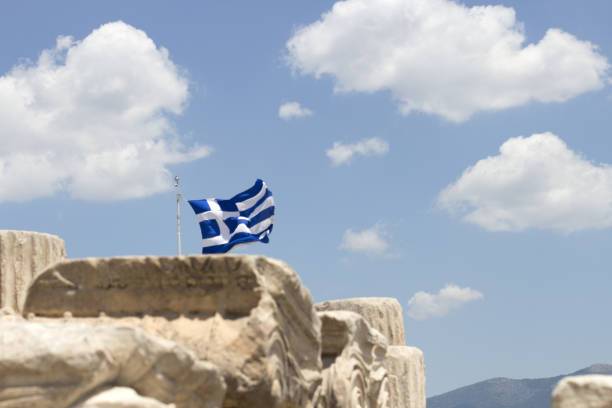 istock Greek flag at Acropolis in Athens, Greece 1184854672