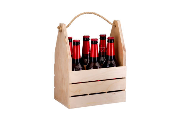 istock Wooden box with bottles on a white background 1184854905