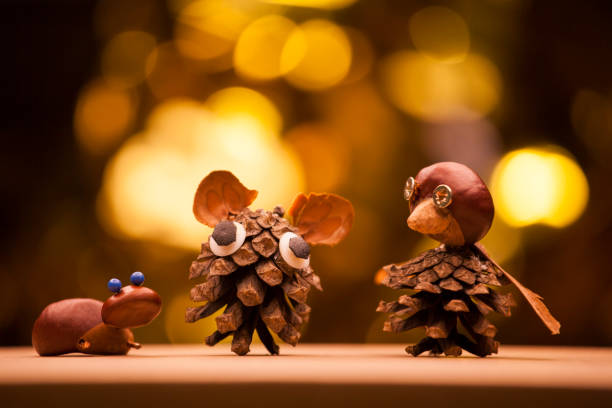istock chestnut cone paper box gold bokeh 1184857118