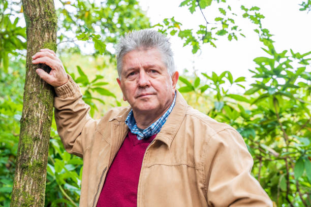 istock Active senior man in countryside portrait 1184862861