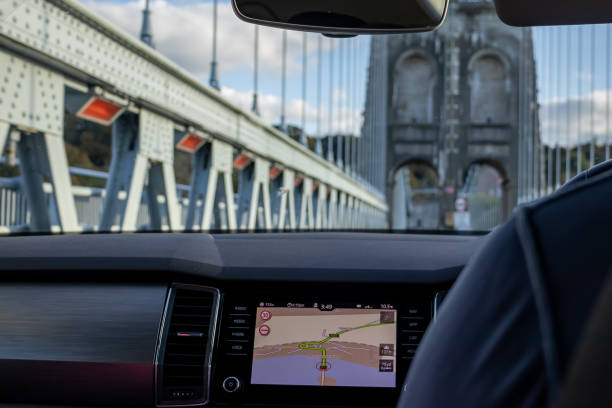istock Car smart navigation system, hi-tech look, road bridge in the background 1184862962