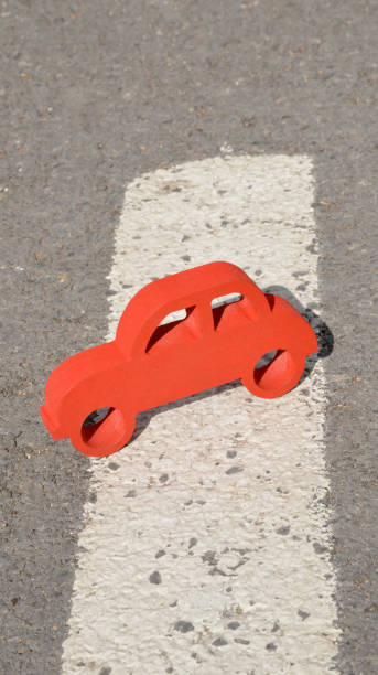 istock handmade miniature red toy car 1184866856