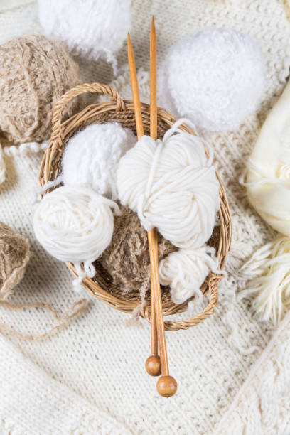 istock Wool for knitting with knitting needles in bright colors 1184867372