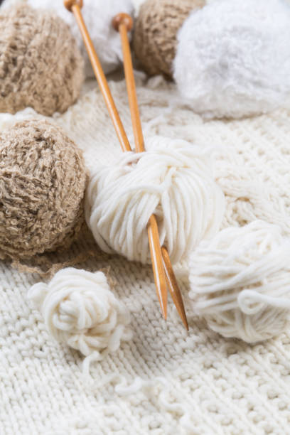 istock Wool for knitting with knitting needles in bright colors 1184867430