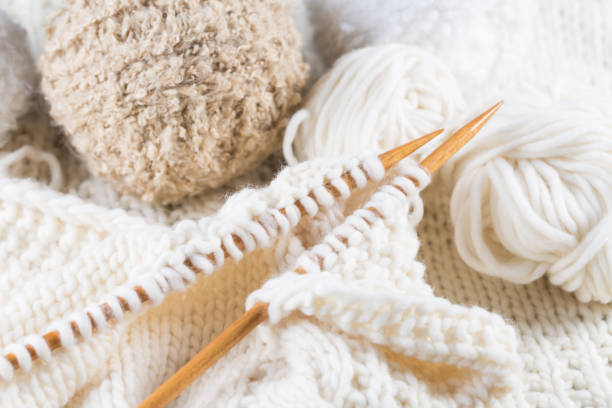 istock Wool for knitting with knitting needles in bright colors 1184867468