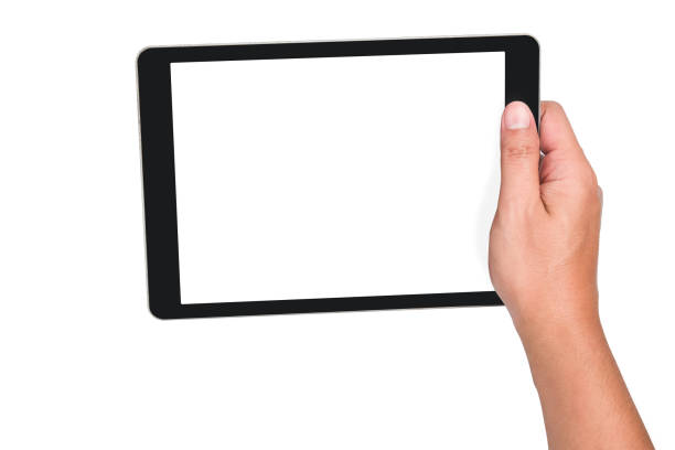 istock Human hand holding the touch screen tablet on isolated white background with clipping path. 1184868609