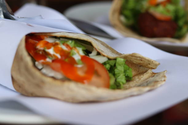 istock Full vegan falafel wrap 1184877109