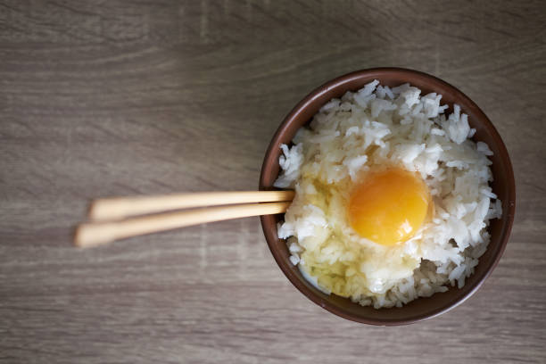 istock Japanese tamago kake gohan with raw egg in bowl 1184877433