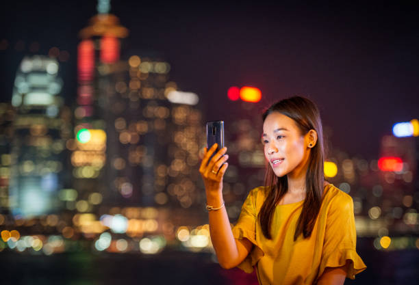 istock Making a video call in Hong Kong 1184877440