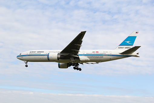 London, United Kingdom - August 16 2015: Commercial passenger airplane Boeing 777 of Kuwait Airways on its regular route from Kuwait landing at the London Heathrow International Airport