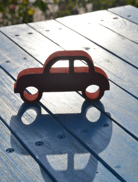 istock handmade miniature red toy car 1184882905