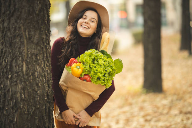 istock Woman having a fun and shopping grocery 1184883537