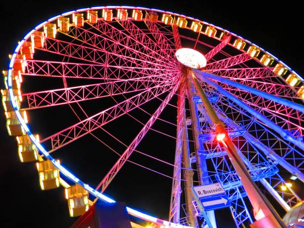 istock Colourful Ferris Wheel at Night 1184888736