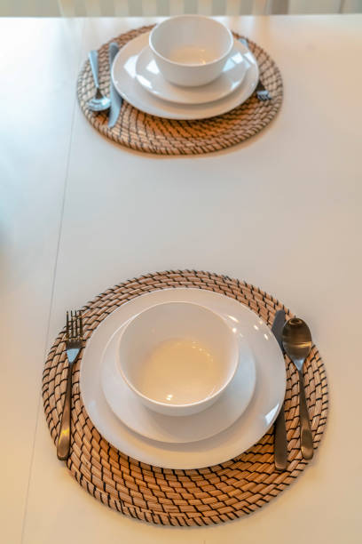 istock Modern table setting with cutlery and crockery 1184890303