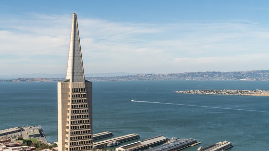 San Francisco, California, USA - August 2019: The top of Transamerica Pyramid, famous skyscraper in San Francisco skyline