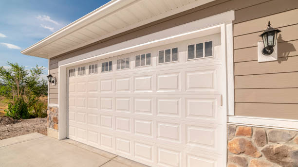 istock Panorama frame Double garage of modern home on sunny, clear day 1184892162