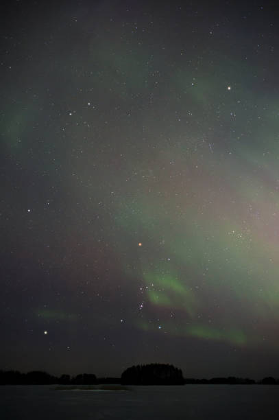 istock Winter constellations and Aurora borealis 1184893074