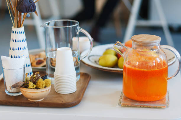 istock Jug with pumpkin tea on the table. 1184894633