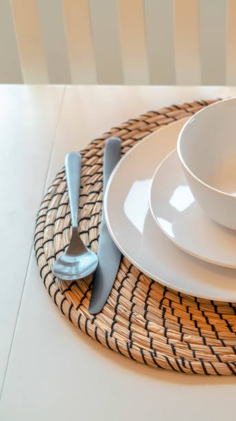 istock Vertical Modern dinner setting with cutlery and crockery 1184896041