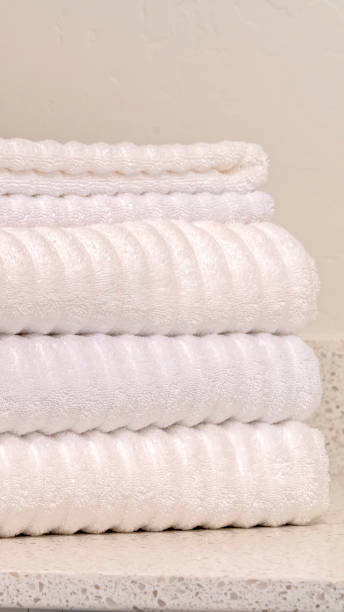 istock Vertical frame Pile of clean absorbent ribbed cotton towels 1184896157