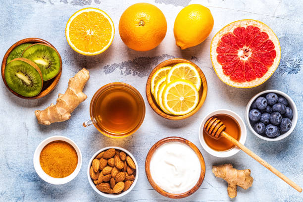 productos saludables para aumentar la inmunidad y remedios para el resfriado - fruit winter orange lemon fotografías e imágenes de stock