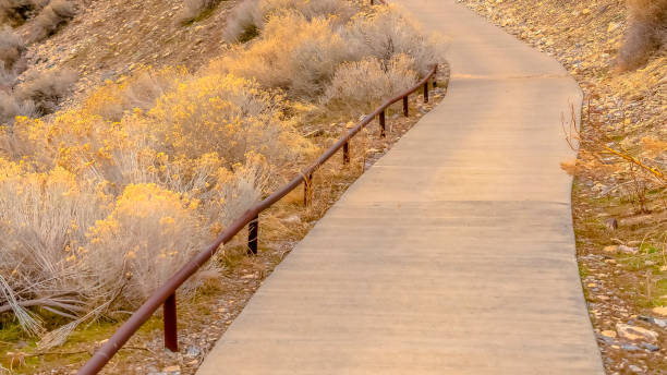 istock Panorama frame Steep footpath or hiking trail climbing a mountain 1184897827