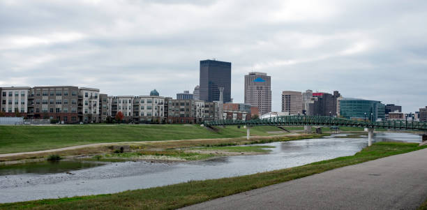 istock City Skyline with Riverscape View on Overcast Fall Day ( 1184898621