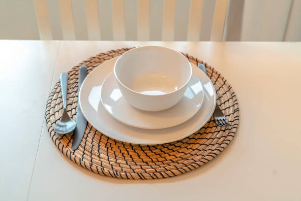 istock Modern dinner setting with cutlery and crockery 1184899066