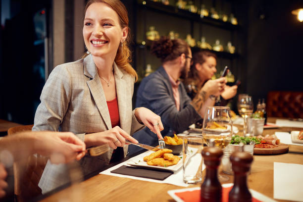 istock Friends having dinner at restaurant. 1184901523