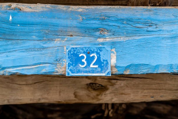 istock a blue door number on a blue house 1184906797