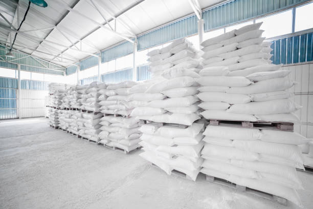 Warehouse with a large number of white sacks, stacked high
