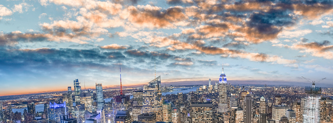 Amazing panoramic sunset aerial skyline of Manhattan from a high vantage point, New York City, USA