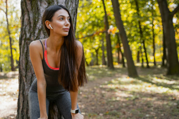 istock Pretty woman resting during her working out 1184912278
