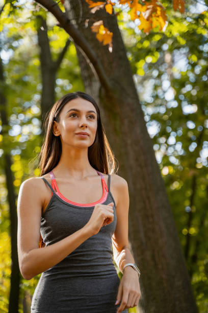 istock Woman being happy to keep hersel fit 1184912470